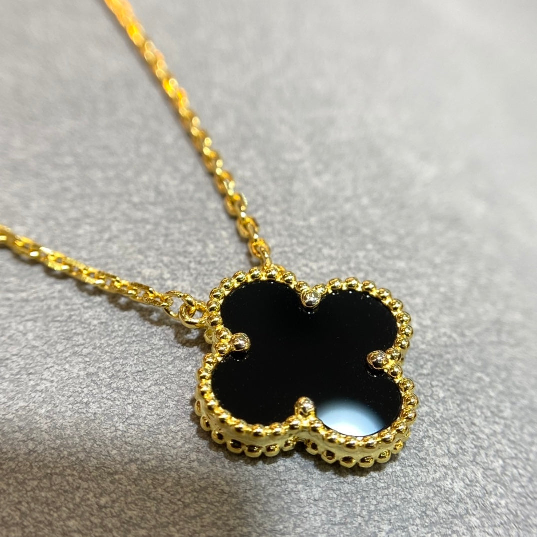 Leaf Clover Lavish Necklace in Gold with Black Accent